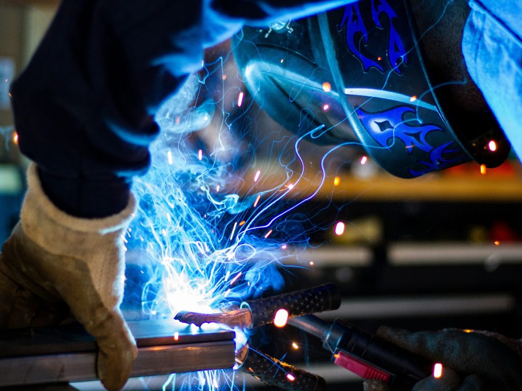 Welder as manufacturing executives are wagering nearly half their modernisation budgets on AI, betting these systems will boost profit within two years.
