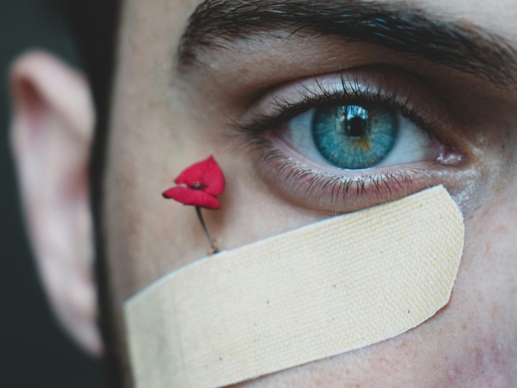 Person wearing a bandage as Ericsson's Cognitive Network Solutions has joined forces with AWS to develop agentic AI technologies for self-healing mobile networks in the telecoms industry.