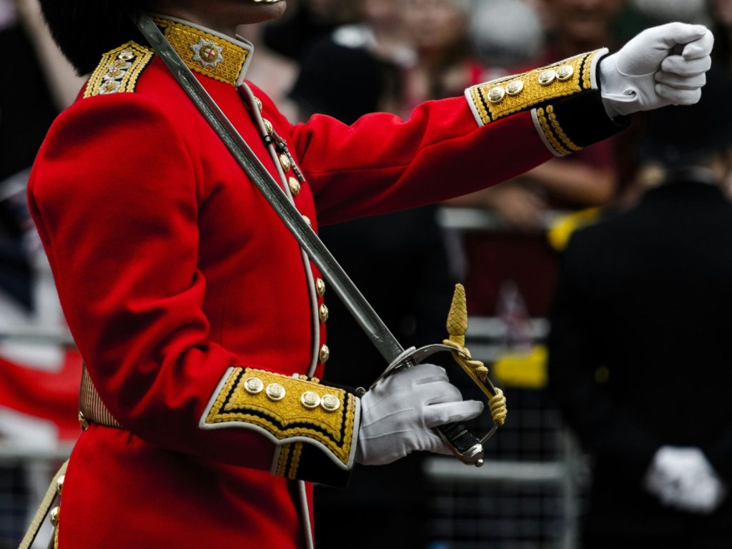 Member of the King's Guard from the British Army as the UK Ministry of Defence (MOD) has selected Red Hat to architect a unified AI and hybrid cloud backbone across its entire estate.